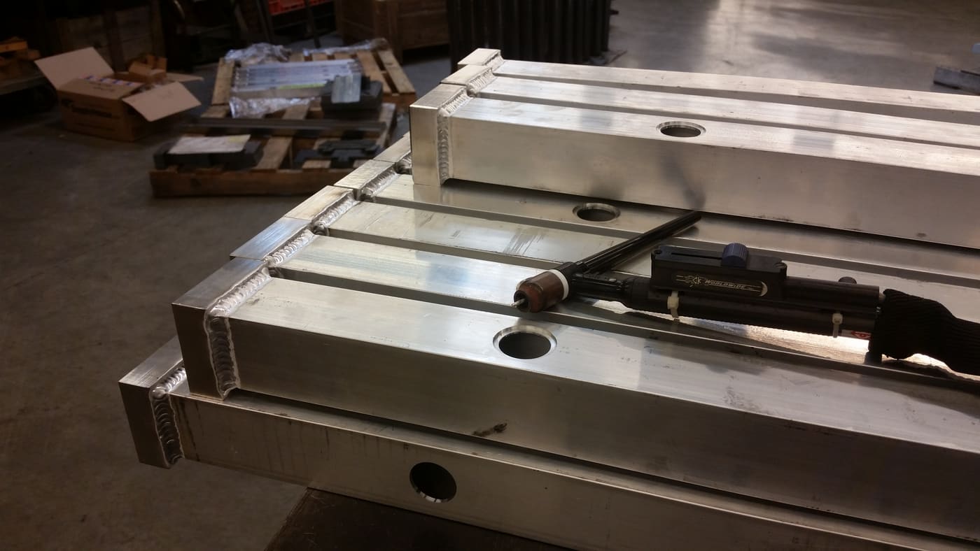 Large fabricated aluminium fixture base, welded and machined flat